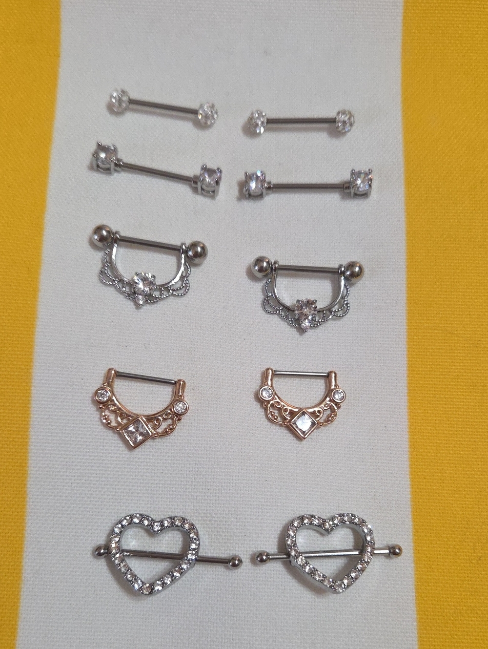 Set of Decorative Nipple Ring Barbells in Silver and Rose Gold Tones 5 Pack